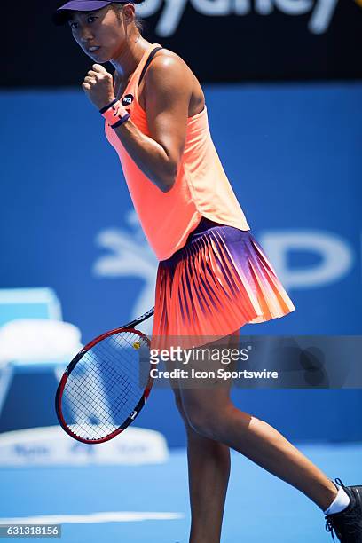 China's top ranked player Zhang Shuai reacts during her match against Eugenie Bouchard during the first day of the Apia International Sydney on...