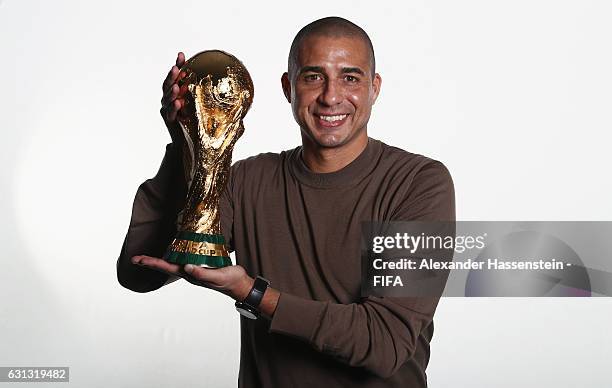 David Trezeguet of France poses with the FIFA World Cup trophy prior to The Best FIFA Football Awards at Kameha Zurich Hotel on January 9, 2017 in...