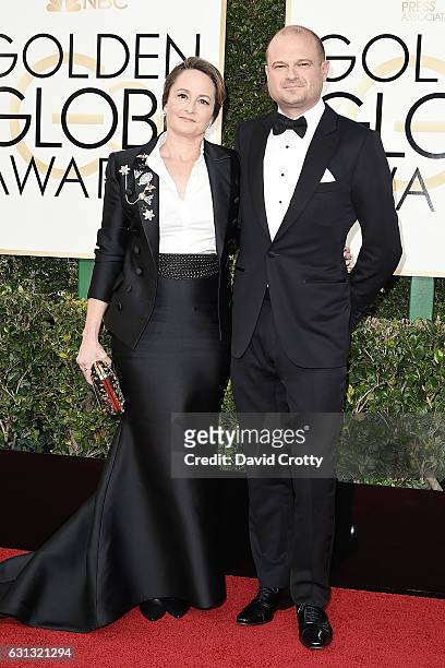 Nina Jacobson and Brad Simpson attend the 74th Annual Golden Globe Awards - Arrivals at The Beverly Hilton Hotel on January 8, 2017 in Beverly Hills,...