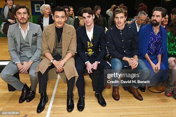 Robert Konjic, Hu Bing, RJ Mitte, Toby Huntington-Whiteley and Jack Guinness attend the Vivienne Westwood show during London Fashion Week Men's...