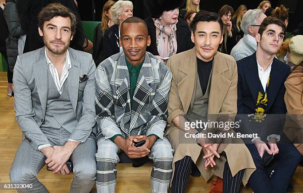 Robert Konjic, Eric Underwood, Hu Bing and RJ Mitte attend the Vivienne Westwood show during London Fashion Week Men's January 2017 collections at...