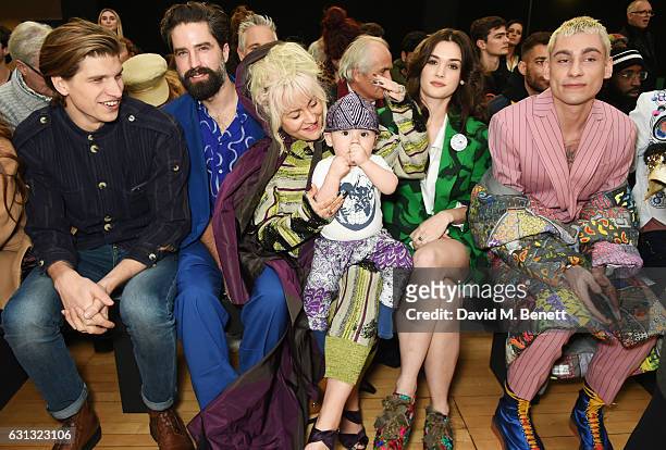 Toby Huntington-Whiteley, Jack Guinness, Jaime Winstone with Baby Ray, Sai Bennett and Kyle De'Volle attend the Vivienne Westwood show during London...