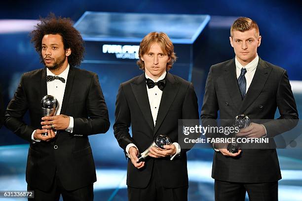 The awardees for the FIFA FIFPro World11 award, Real Madrid and Brazil's defender Marcelo, Real Madrid and Croatia's midfielder Luka Modric and Real...
