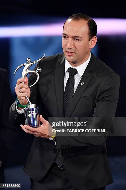 Colombian executive and chairman of Atletico Nacional Juan Carlos de la Cuesta holds The 2016 FIFA Fair Play Award during The Best FIFA Football...