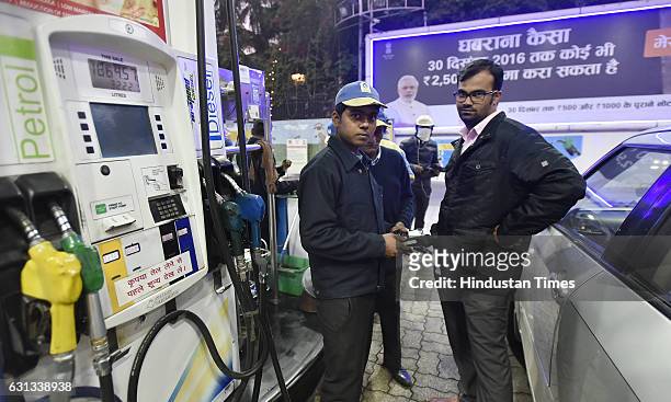Petrol pump accepting payment through debit and credit cards on January 9, 2017 in New Delhi, India. Government cleared that credit and debit cards...