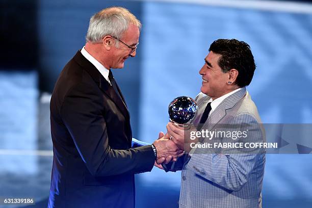 Leicester City's Italian manager Claudio Ranieri is presentend with The Best FIFA Mens Coach of 2016 Award by former Argentine football player Diego...