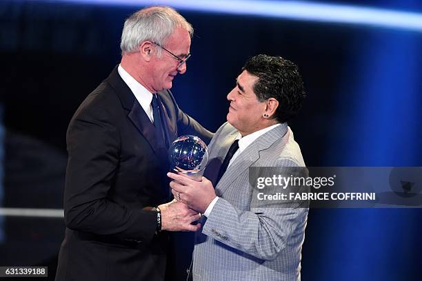 Leicester City's Italian manager Claudio Ranieri is presentend with The Best FIFA Mens Coach of 2016 Award by former Argentine football player Diego...