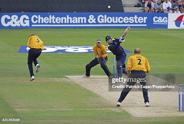 Yorkshire captain Craig White hits Hampshire captain Shaun Udal for 4 runs during his innings of 40 not out in the Cheltenham & Gloucester Trophy...