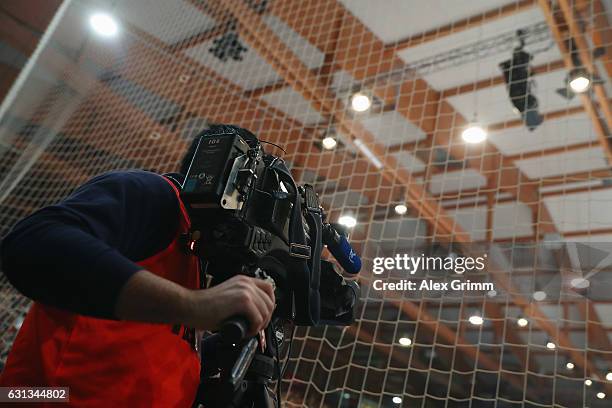 Camera man works behind the goal during the international handball friendly match between Germany and Austria at Rothenbach-Halle on January 9, 2017...