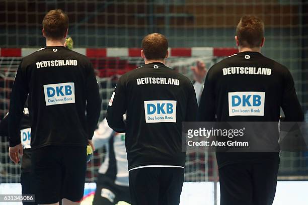 The logo of the German team's sponsor DKB is seen during warm up prior to the international handball friendly match between Germany and Austria at...