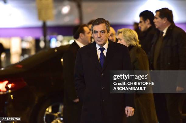 Former French prime Minister Francois Fillon , the right wing Republican party candidate for the French 2017 presidential election, walks following a...