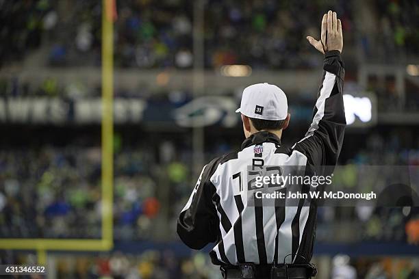 Playoffs: Rear view of referee Brad Allen making call during Seattle Seahawks vs Detroit Lions at CenturyLink Field. Seattle, WA 1/7/2017 CREDIT:...