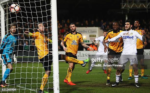 Alex Mowatt of Leeds United scores their second goal during the Emirates FA Cup Third Round match between Cambridge United and Leeds United at Cambs...