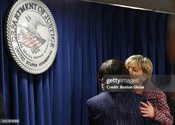 Mary Rizzo, right, the mother of Jonathan Rizzo, who was murdered by Gary Lee Sampson, embraces US District Attorney Carmen Ortiz after they...