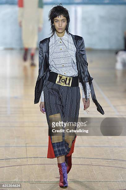 Model walks the runway at the Vivienne Westwood Autumn Winter 2017 fashion show during London Menswear Fashion Week on January 9, 2017 in London,...