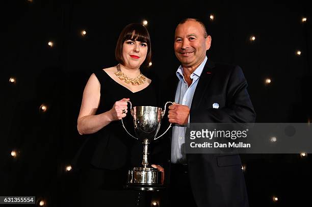 Eddie Jones, Head Coach of England is presented with the Rugby Union Writers' Club Pat Marshall Award by Sarah Mockford during the Rugby Union...