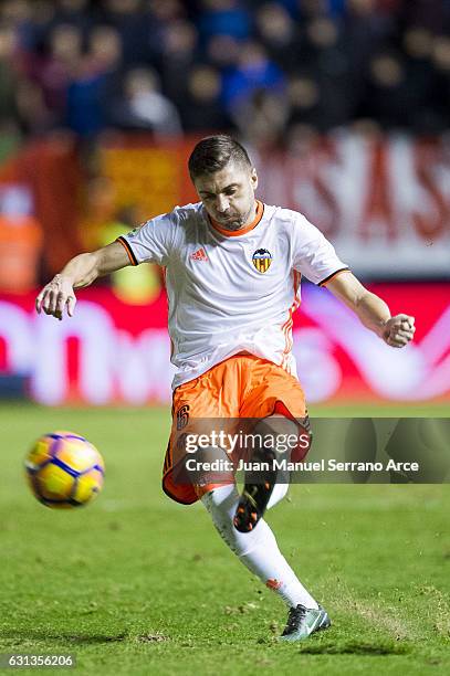 Guilherme Siqueira of Valencia CF controls the ball during the La Liga match between CA Osasuna and Valencia CF at Estadio Reyno de Navarra on...