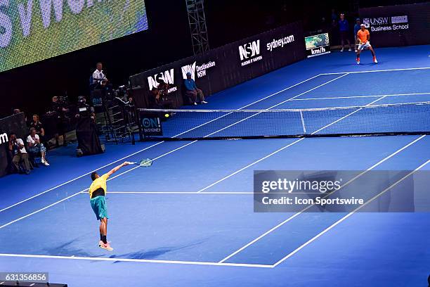 Nick Kyrgios and Rafael Nadal in action during the FAST4 Showdown AUS v WORLD played at the International Convention Center in Sydney. Nick Kyrgios...