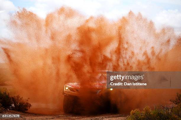 Cyril Despres of France and Peugeot Total drives with co-driver David Castera of France in the 3008 DKR Peugeot car in the Classe : T1.4 2 Roues...