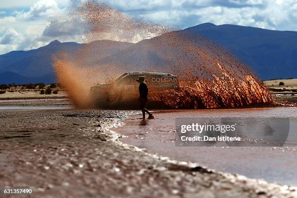 Juan Silva of Argentina and Mercedes Colcar drives with co-driver Sergio Lafuente of Uruguay in the Prototipo Colcar Mercedes car during stage seven...