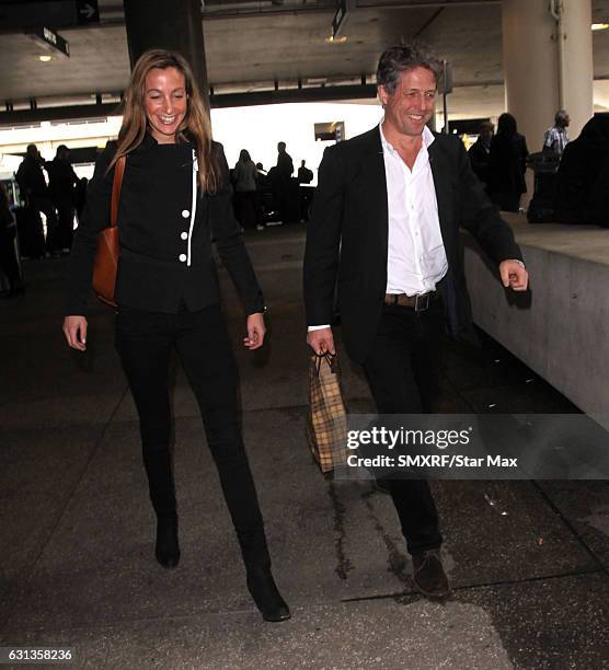 Anna Eberstein and Hugh Grant are seen on January 9, 2017 in Los Angeles, California.