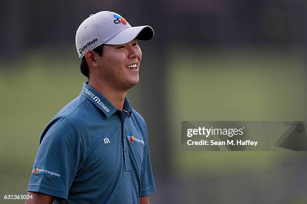 Si Woo Kim of Korea looks on during practice rounds prior to the Sony Open In Hawaii at Waialae Country Club on January 9, 2017 in Honolulu, Hawaii.