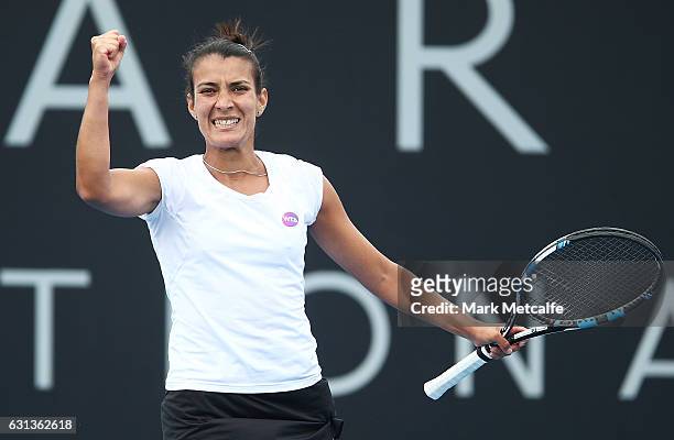 Veronica Cepede Royg of Paraguay celebrates winning match point in her second round match against Andrea Petkovic of Germany during day one of the...