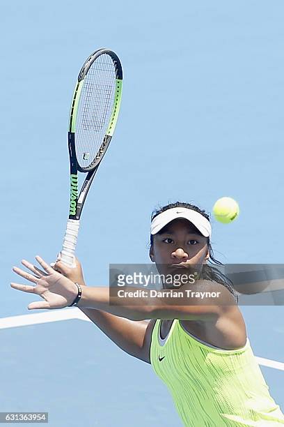 Destanee Aiava of Australia plays a forehand shot in her match against Saurian Cirstea of Romania during day one of the 2017 Priceline Pharmacy...