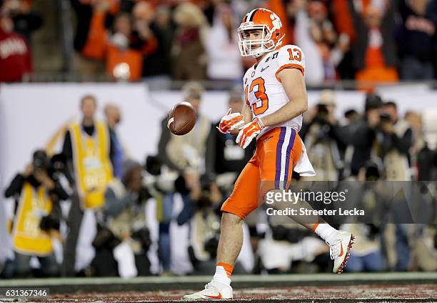 Wide receiver Hunter Renfrow of the Clemson Tigers celebrates after catching a 24-yard touchdown pass during the third quarter against the Alabama...