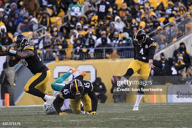Pittsburgh Steelers punter Jordan Berry punts the ball during the NFL Football Wild Card Playoff game between the Miami Dolphins and the Pittsburgh...