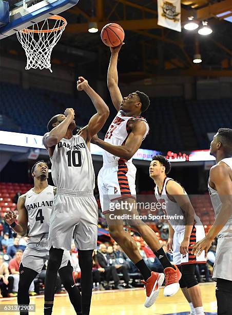 Illinois-Chicago Flames forward Tai Odiase scores during a NCAA Basketball game between the Oakland Golden Grizzlies and the UIC Flames on January 8,...