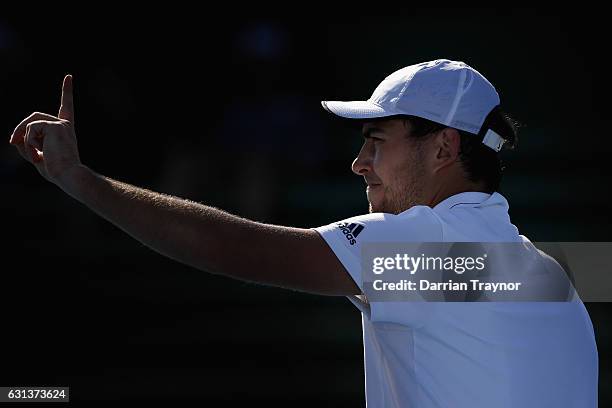 Jerzy Janowicz of Poland indicates to his opponent Tommy Haas of Germany during day one of the 2017 Priceline Pharmacy Classic at Kooyong on January...