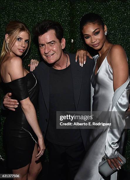 Actors Charlotte McKinney, Charlie Sheen and Chanel Iman attend the premiere party for Crackle's "Mad Families" at Catch on January 9, 2017 in West...