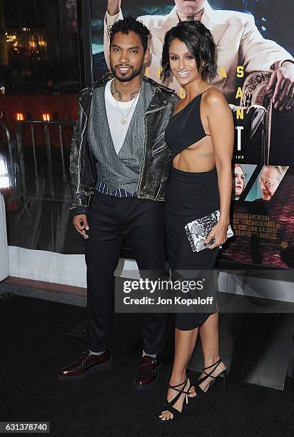 Singer Miguel and Nazanin Mandi arrive at the Premiere of "Live By Night" at TCL Chinese Theatre on January 9, 2017 in Hollywood, California.
