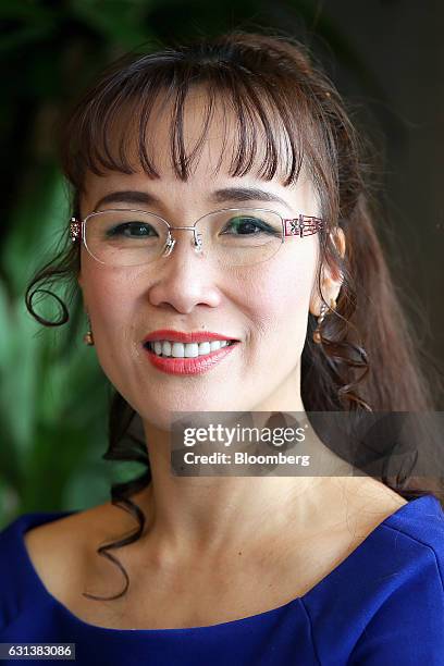 Billionaire Nguyen Thi Phuong Thao, founder and chief executive officer of VietJet Aviation Joint Stock Co., stands for a photograph following an...