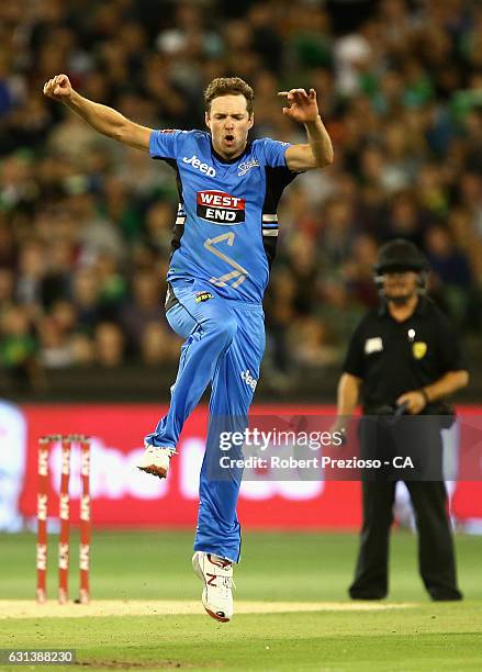 Ben Laughlin of the Strikers celebrates the wicket of Evan Gulbis of the Stars during the Big Bash League match between the Melbourne Stars and the...