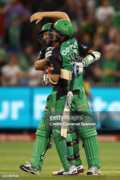 Ben Hilfenhaus of the Stars is congratulated by team mate Michael Beer after hitting the winning runs during the Big Bash League match between the...