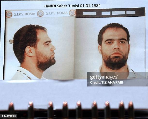 Picture taken on January 10, 2017 shows a mug shot of Hmidi Saber, a suspected member of Ansar al-Sharia, a Libyan group linked to al-Qaeda,...