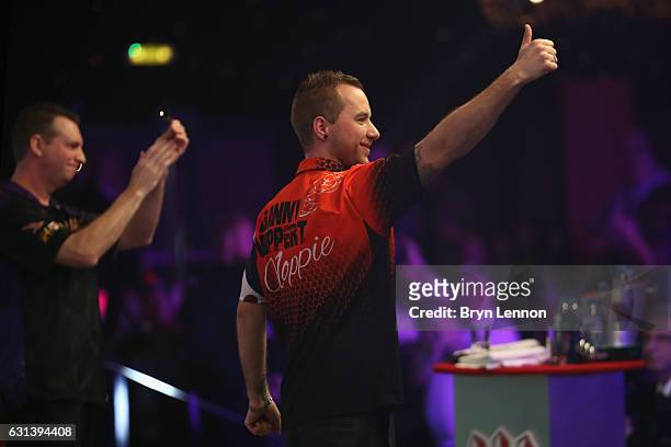 Danny Noppert of Canada waves to the crowd after winning his first round match on day four of the BDO Lakeside World Professional Darts Championships...