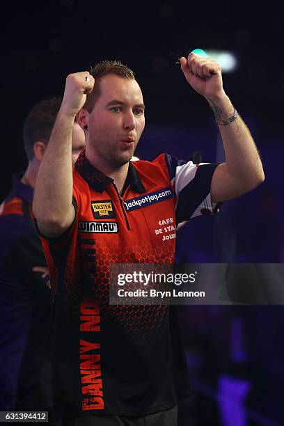 Danny Noppert of Canada celebrates after winning his first round match on day four of the BDO Lakeside World Professional Darts Championships on...