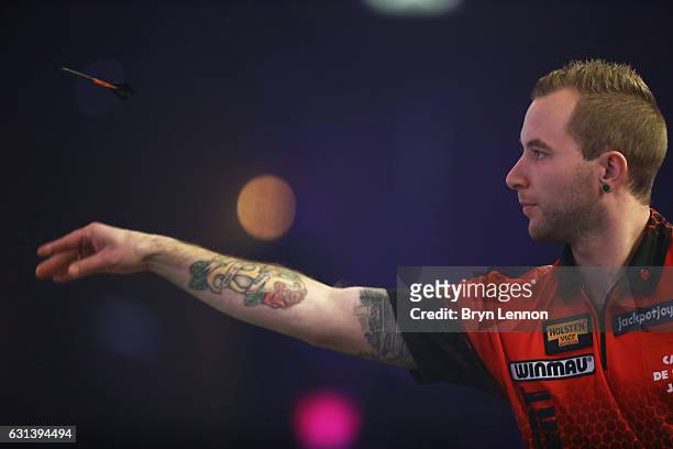 Danny Noppert of Canada in action during his first round match against David Cameron on day four of the BDO Lakeside World Professional Darts...
