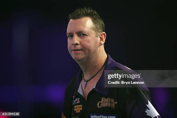 David Cameron of Canada looks on during his first round match on day four of the BDO Lakeside World Professional Darts Championships on January 10,...