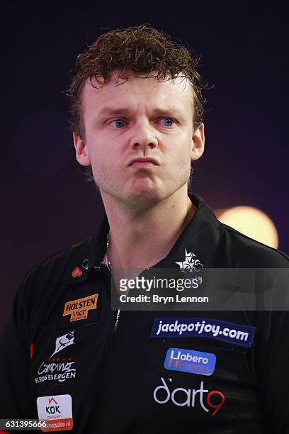 Richard Veenstra of The Netherlands reacts during his first round match on day four of the BDO Lakeside World Professional Darts Championships on...