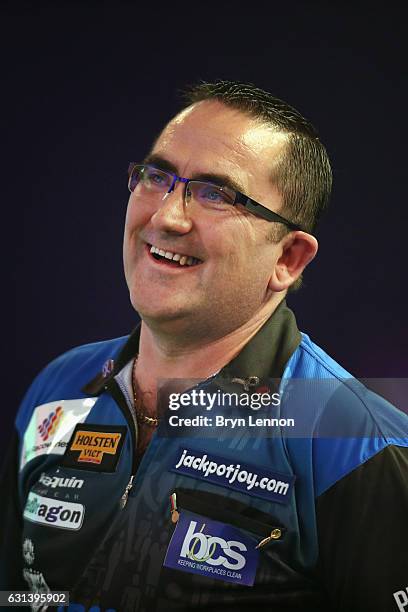 Ross Montgomery of Great Britain reacts during his first round match on day four of the BDO Lakeside World Professional Darts Championships on...