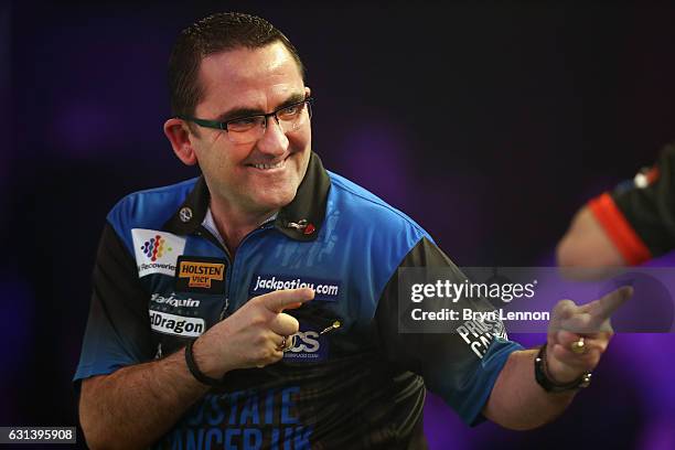 Ross Montgomery of Great Britain reacts during his first round match on day four of the BDO Lakeside World Professional Darts Championships on...