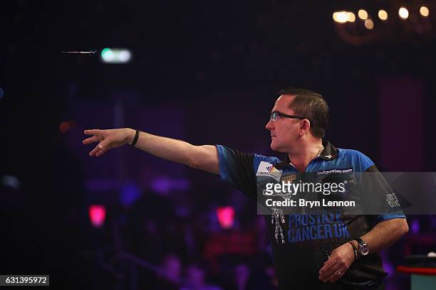 Ross Montgomery of Great Britain in action during his first round match on day four of the BDO Lakeside World Professional Darts Championships on...