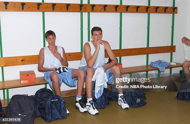 Danilo Gallinari and Andrea Bargnani listens during Basketball without Borders 2003 on June 30, 2003 at La Ghirada, in Treviso, Italy. NOTE TO USER:...