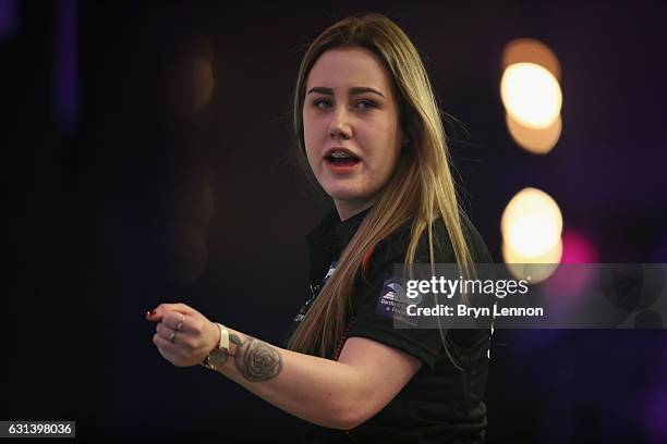 Casey Gallagher of Great Britain reacts during her first round match on day four of the BDO Lakeside World Professional Darts Championships on...