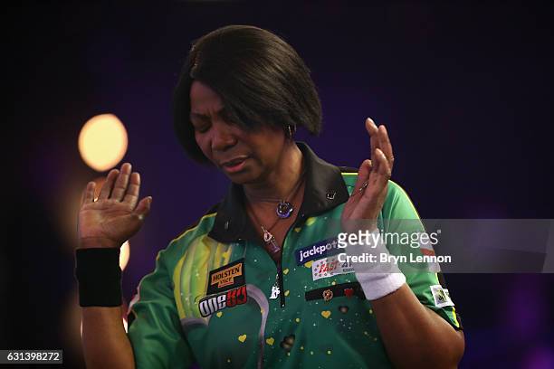 Deta Hedman of Great Britain reacts during her first round match on day four of the BDO Lakeside World Professional Darts Championships on January...