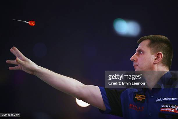 Krzysztof Ratajski of Poland in action during his first round match on day four of the BDO Lakeside World Professional Darts Championships on January...